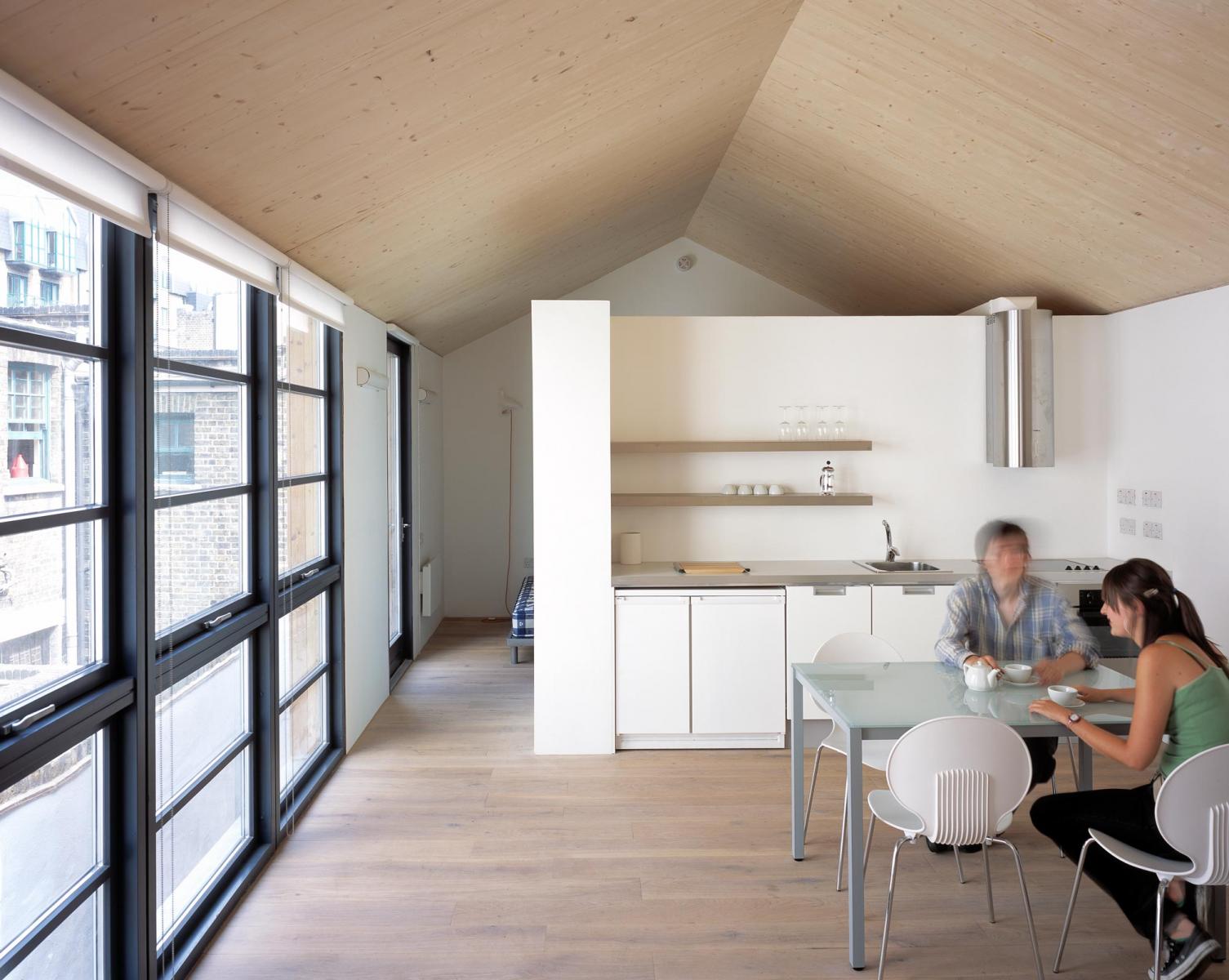 Carlisle Lane Flats, London - View of the Kitchen at exposed timber roof